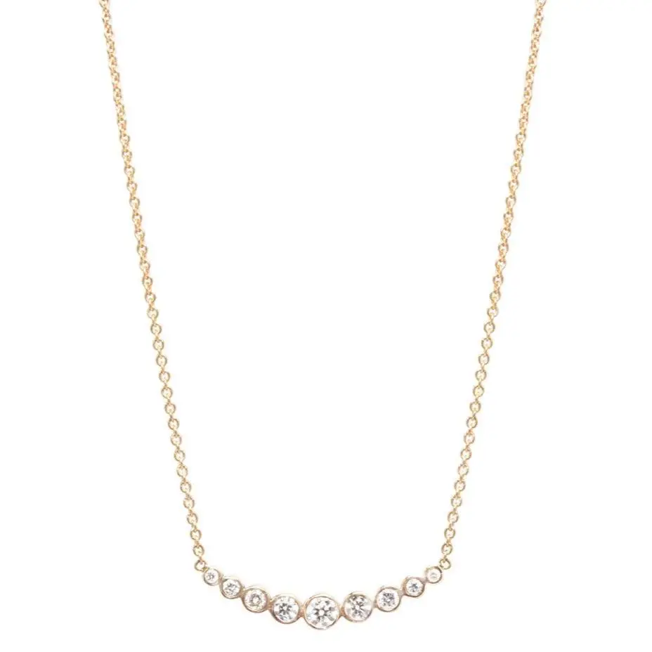 14K Yellow Gold Curved Bar With Nine Graduated Bezel Set Diamonds 1